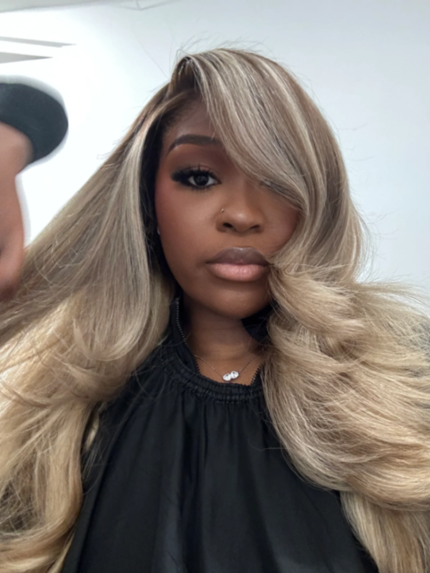 Client wearing a blonde balayage 13x6 wig install